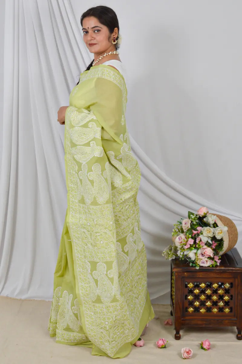 Handcrafted Green Skirt Palla Cotton Saree with intricate Lucknowi Chikankari embroidery and a matching Blouse, ideal for Festive and occasions.