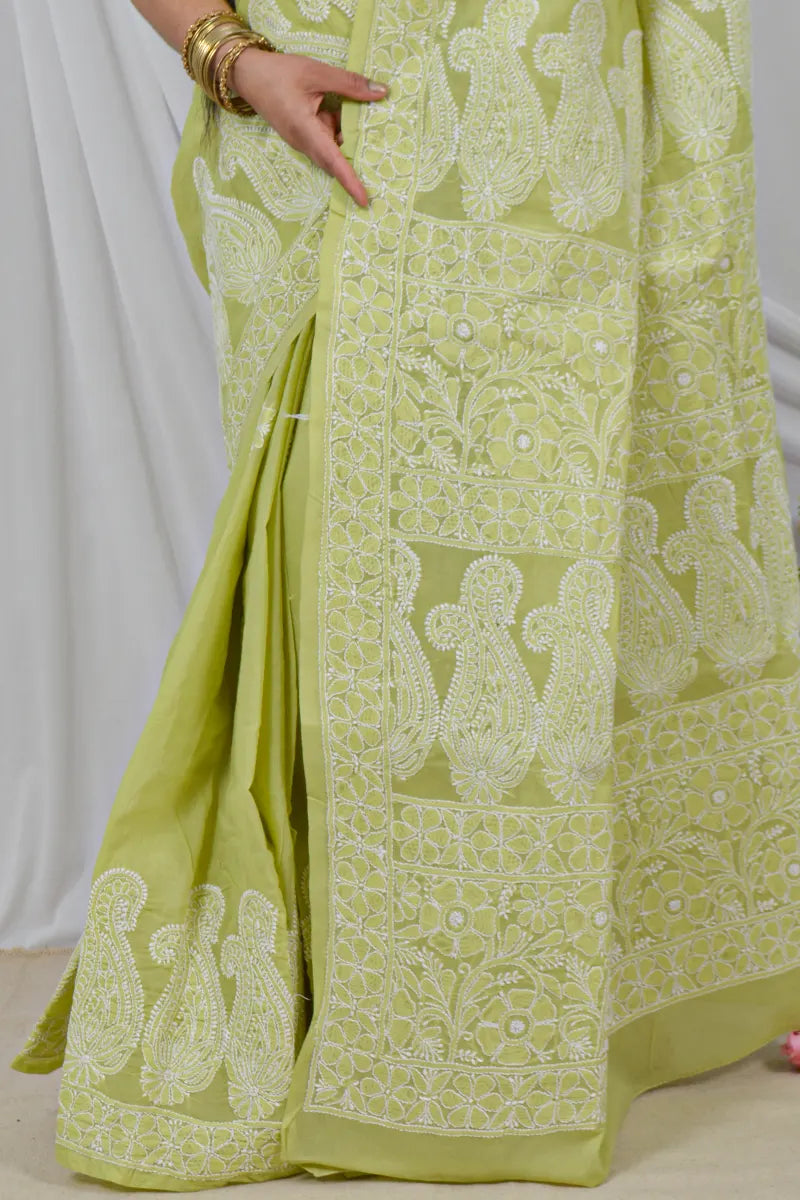 Handcrafted Green Skirt Palla Cotton Saree with intricate Lucknowi Chikankari embroidery and a matching Blouse, ideal for Festive and occasions.
