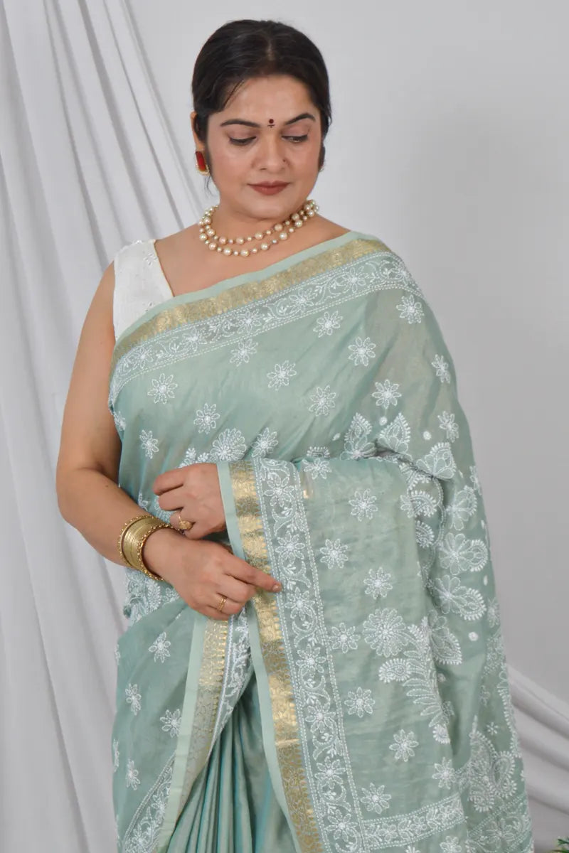 Handcrafted Pista Green chanderi Saree with intricate Lucknowi Chikankari embroidery and a matching Blouse, ideal for Festive and Wedding occasions.
