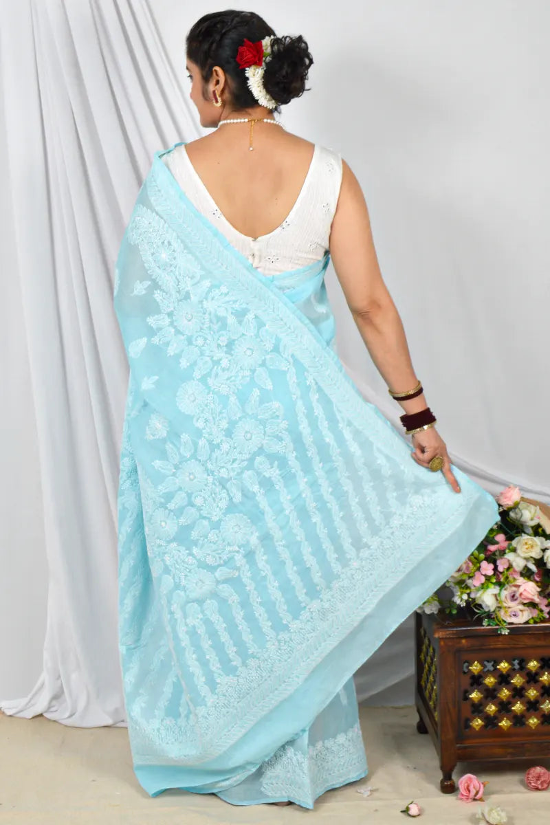 Handcrafted Sky Blue Cotton Saree with intricate Lucknowi Chikankari Embroidery and a matching Blouse, ideal for Festive and occasions.