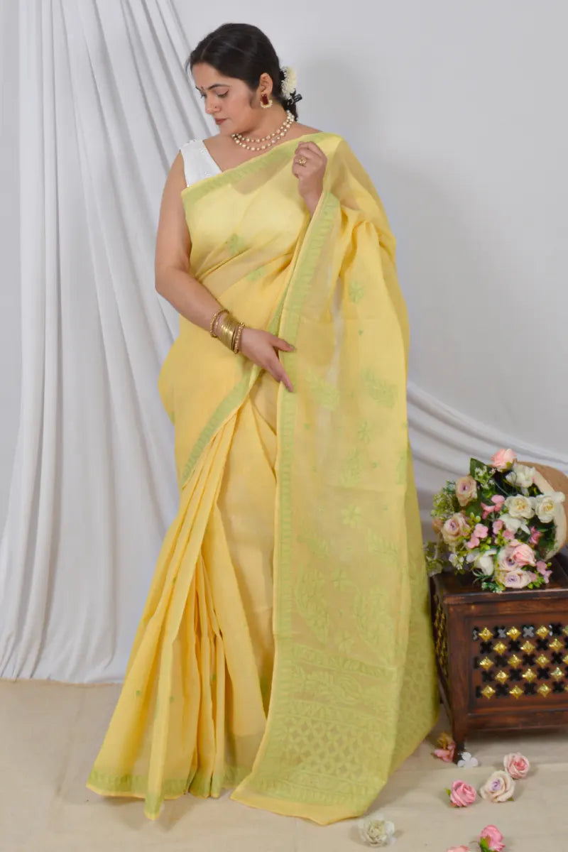 Handcrafted Yellow Cotton Saree with intricate Lucknowi Chikankari embroidery and a matching Blouse, ideal for Festive and occasions.
