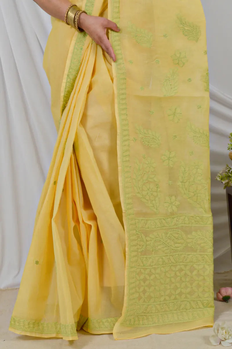 Handcrafted Yellow Cotton Saree with intricate Lucknowi Chikankari embroidery and a matching Blouse, ideal for Festive and occasions.
