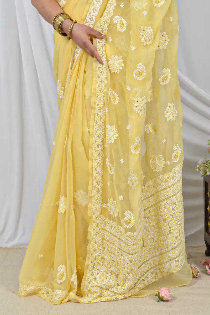 Handcrafted Yellow Georgette Saree with intricate Lucknowi Chikankari Embroidery and a matching Blouse, ideal for Festive and occasions.