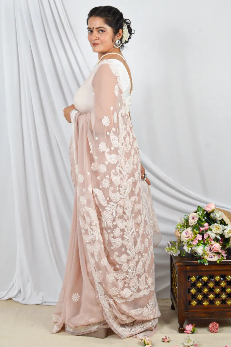 Handcrafted Beige Georgette Saree with Pearl & Sequin Work Designer Lucknowi Chikankari Embroidery and a matching Blouse, ideal for Festive and  occasions.