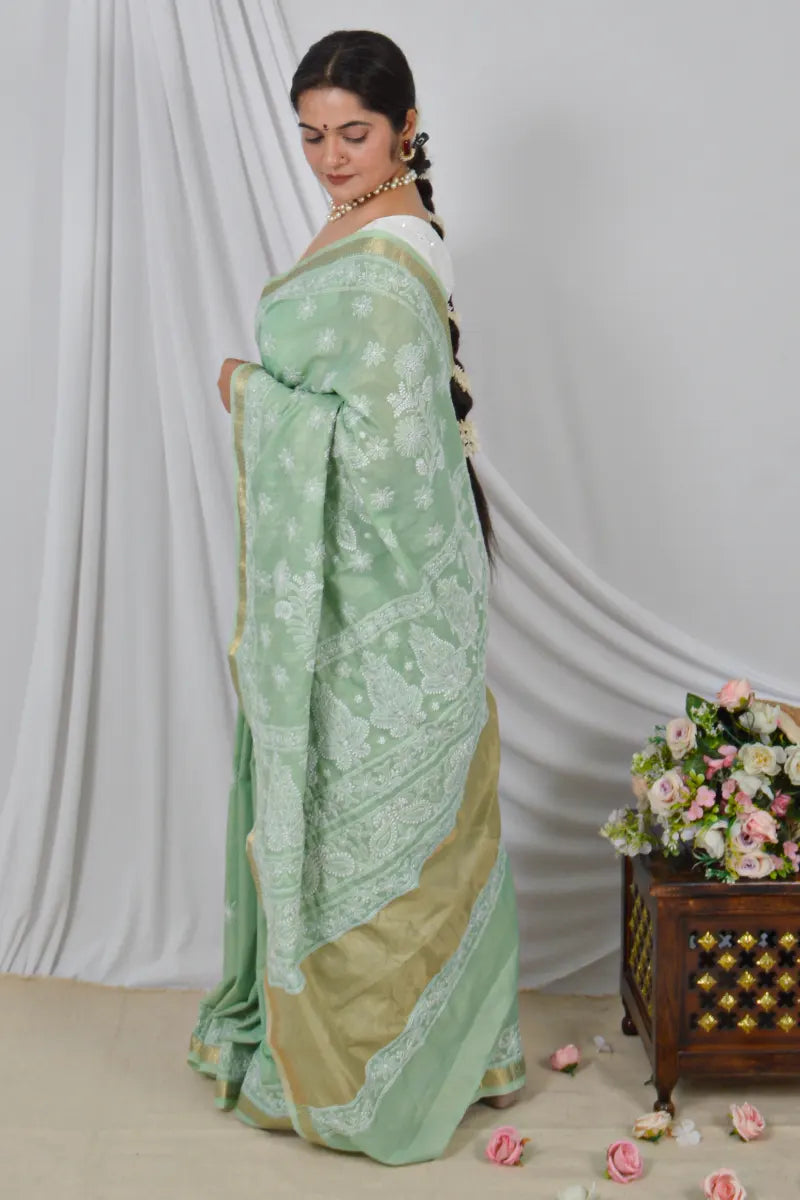 Handcrafted Green chanderi Saree with intricate Lucknowi Chikankari embroidery and a matching Blouse, ideal for Festive and Wedding occasions.