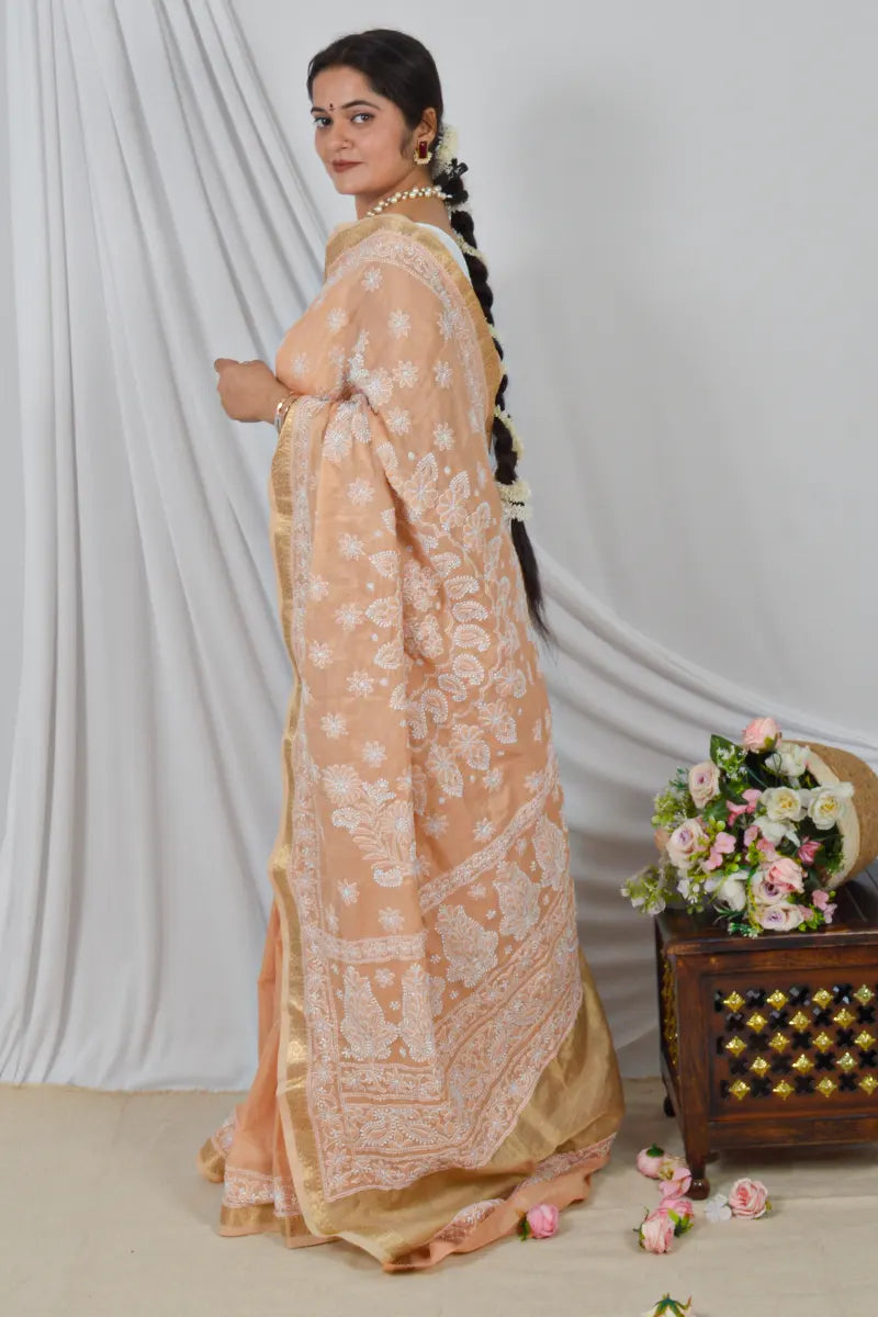 Handcrafted Orange chanderi Saree with intricate Lucknowi Chikankari embroidery and a matching Blouse, ideal for Festive and Wedding occasions.
