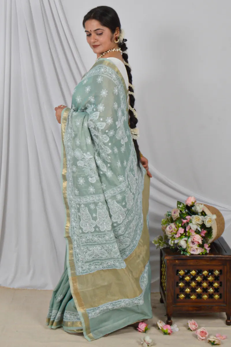 Handcrafted Pista Green chanderi Saree with intricate Lucknowi Chikankari embroidery and a matching Blouse, ideal for Festive and Wedding occasions.