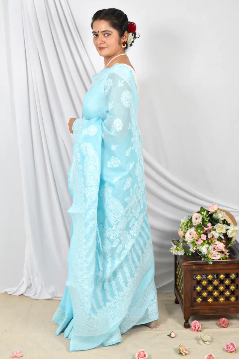 Handcrafted Sky Blue Cotton Saree with intricate Lucknowi Chikankari Embroidery and a matching Blouse, ideal for Festive and  occasions.