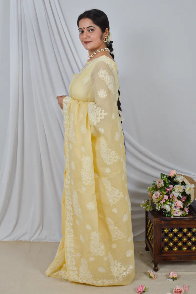 Handcrafted Yellow cotton Saree with intricate Lucknowi Chikankari embroidery and a matching Blouse, ideal for Festive and  occasions.