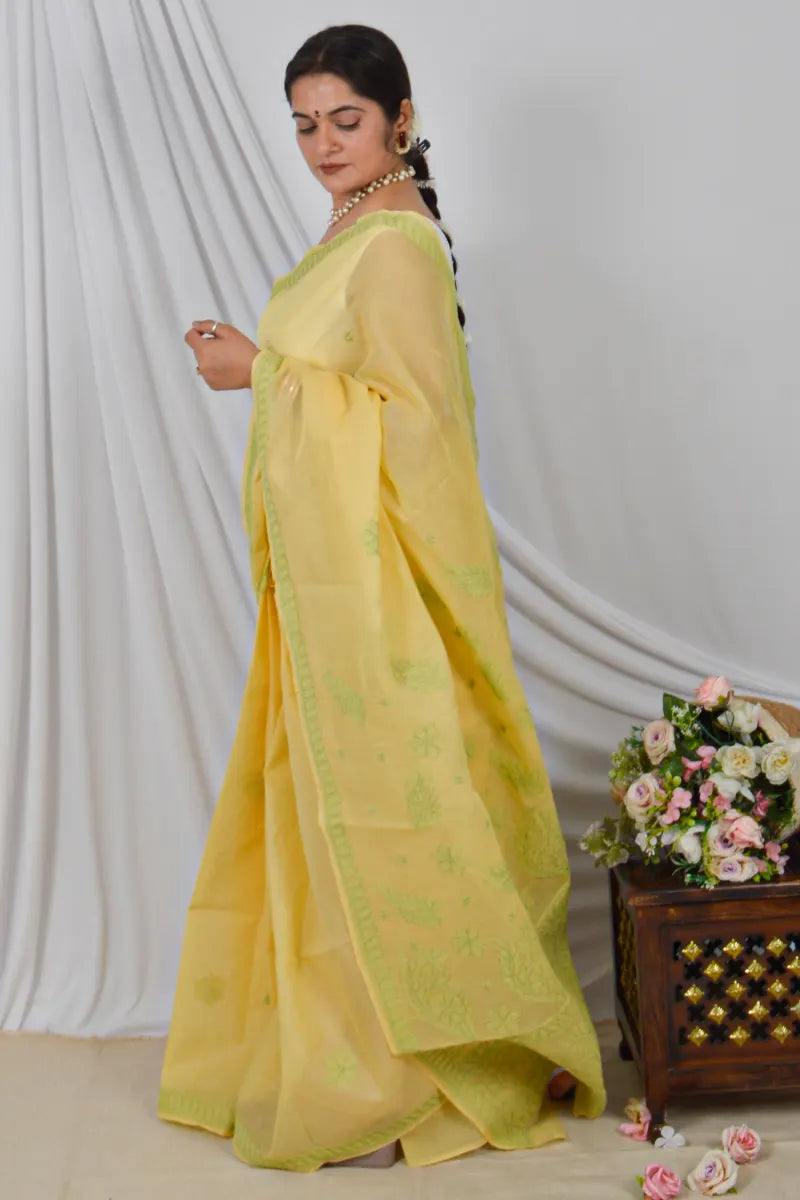 Handcrafted Yellow Cotton Saree with intricate Lucknowi Chikankari embroidery and a matching Blouse, ideal for Festive and  occasions.