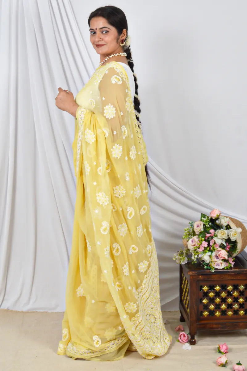 Handcrafted Yellow Georgette Saree with intricate Lucknowi Chikankari Embroidery and a matching Blouse, ideal for Festive and  occasions.